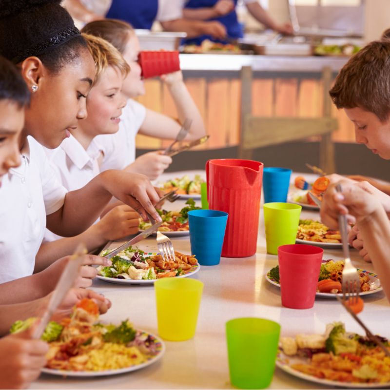 Kids eating in school canteen
